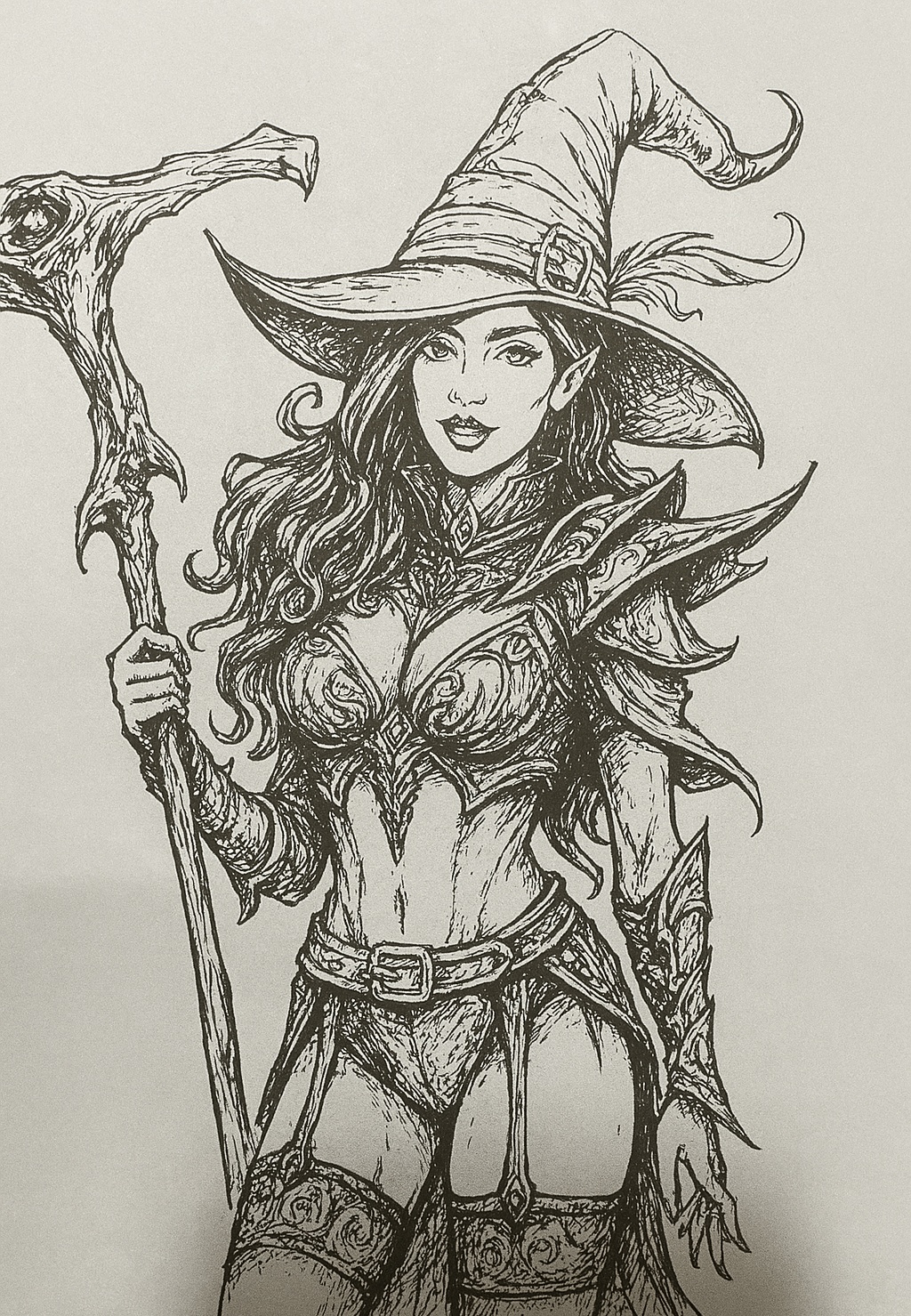 Ink drawing of an elf witch with a gnarled staff, pointed hat and minimal armour.